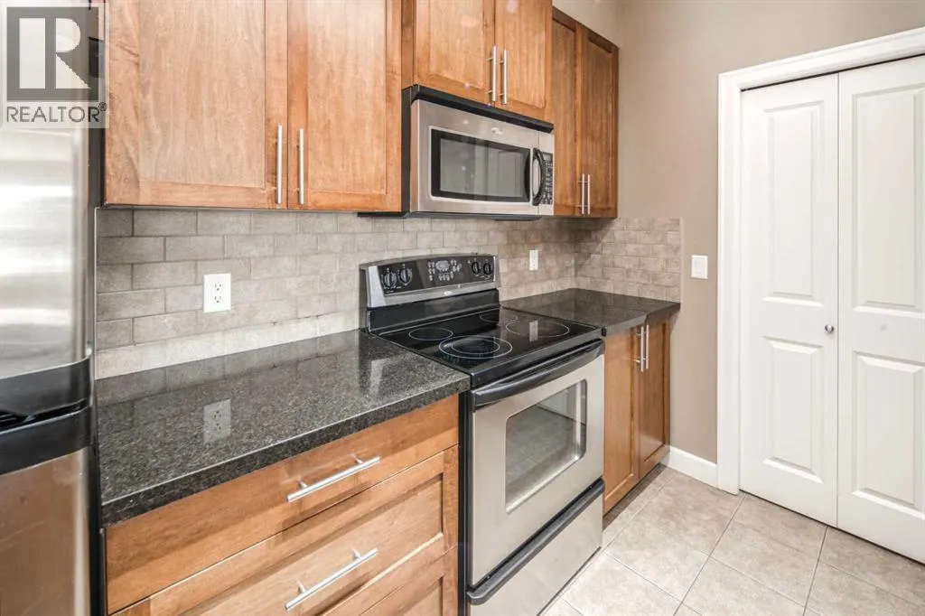 203, 88 Arbour Lake Road NW
