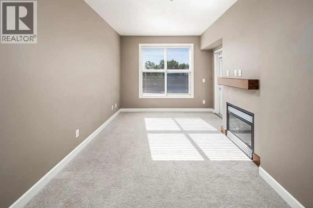 203, 88 Arbour Lake Road NW