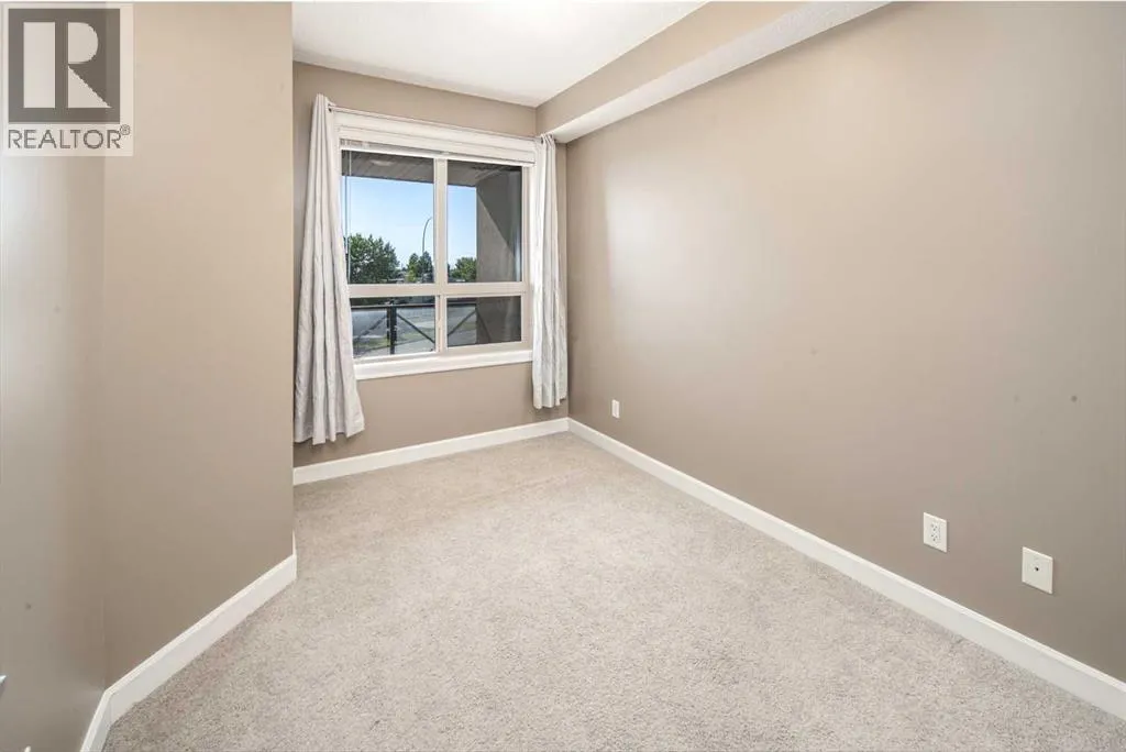 203, 88 Arbour Lake Road NW