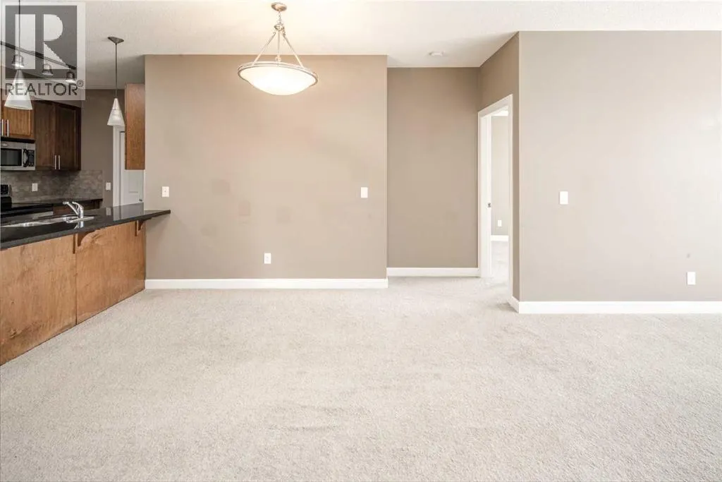 203, 88 Arbour Lake Road NW