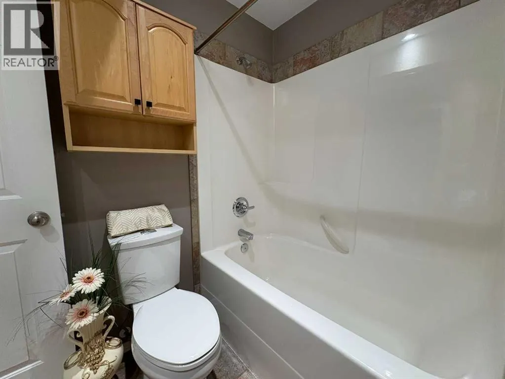 B, 410 Canyon Boulevard W