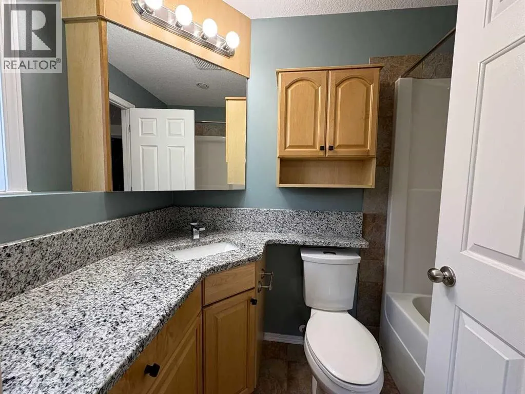 B, 410 Canyon Boulevard W