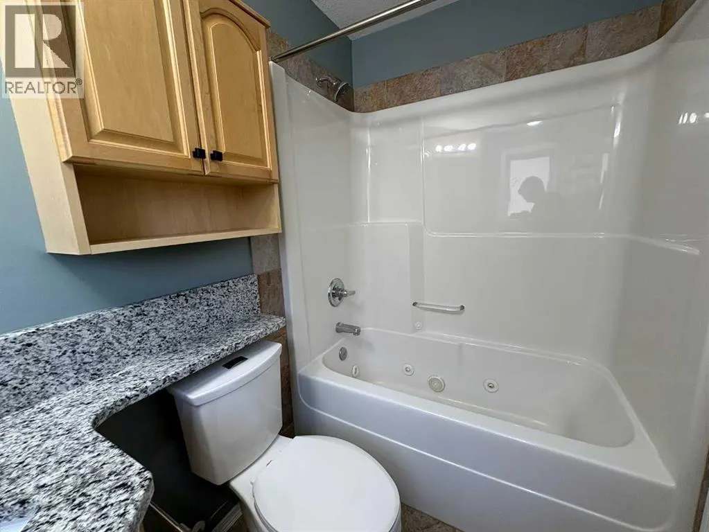 B, 410 Canyon Boulevard W