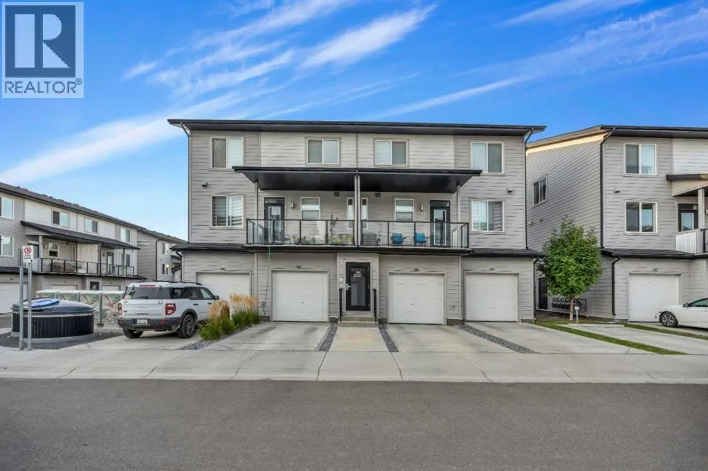 203, 140 Redstone Walk NE