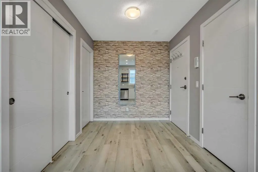 203, 140 Redstone Walk NE