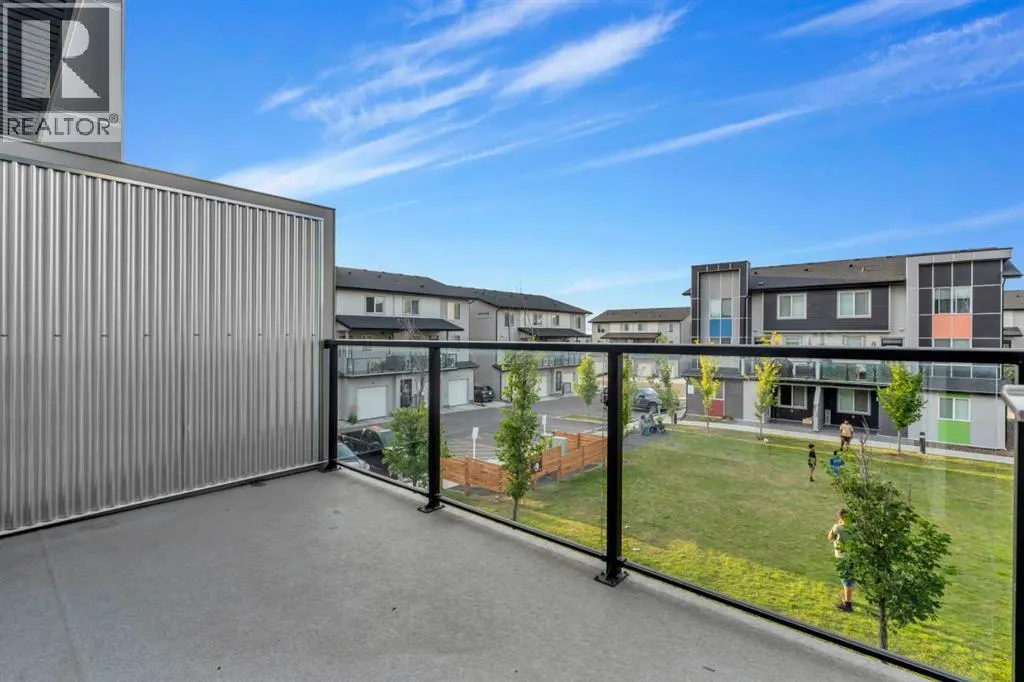 203, 140 Redstone Walk NE