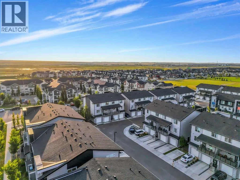 203, 140 Redstone Walk NE