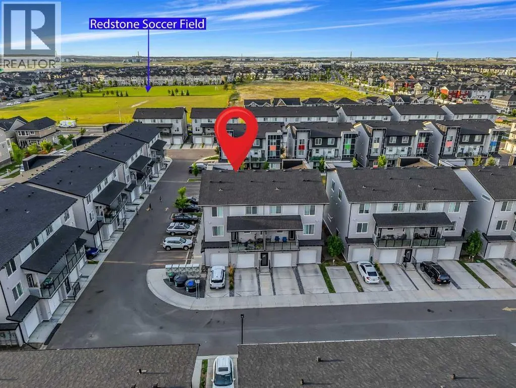 203, 140 Redstone Walk NE
