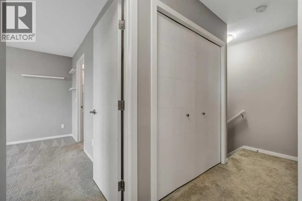 203, 140 Redstone Walk NE