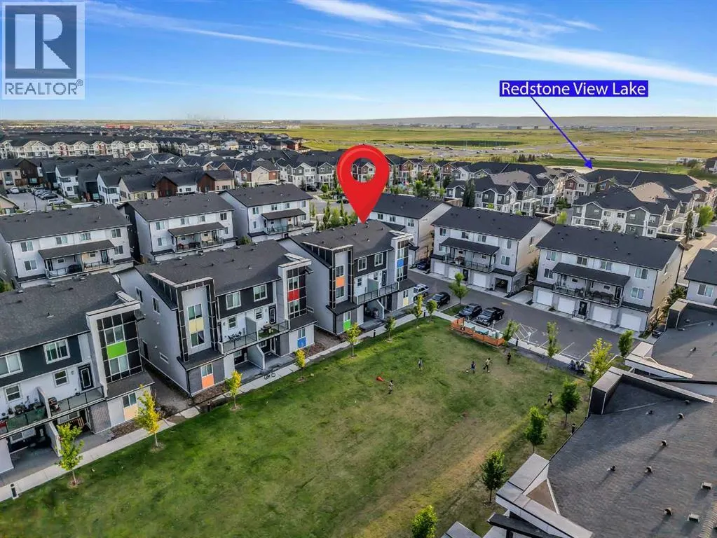 203, 140 Redstone Walk NE