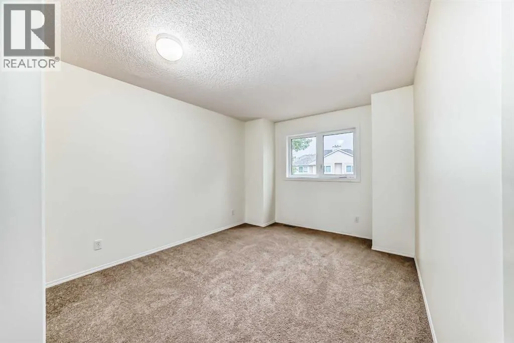 111, 388 Sandarac Drive NW