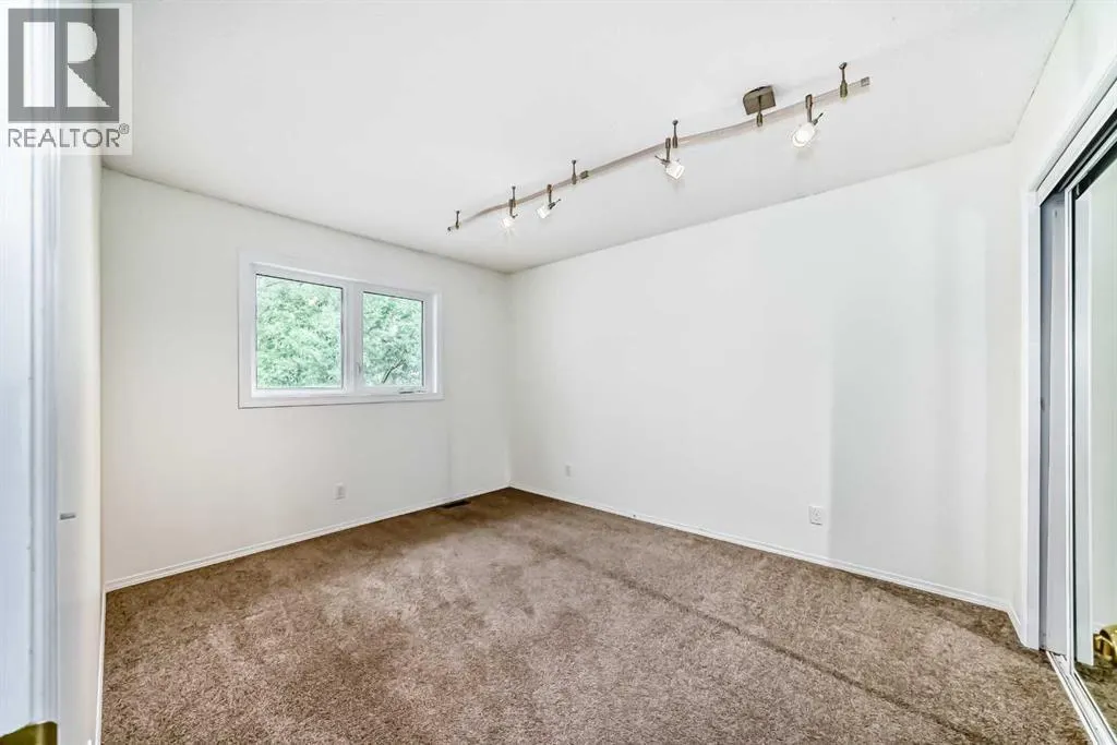 111, 388 Sandarac Drive NW