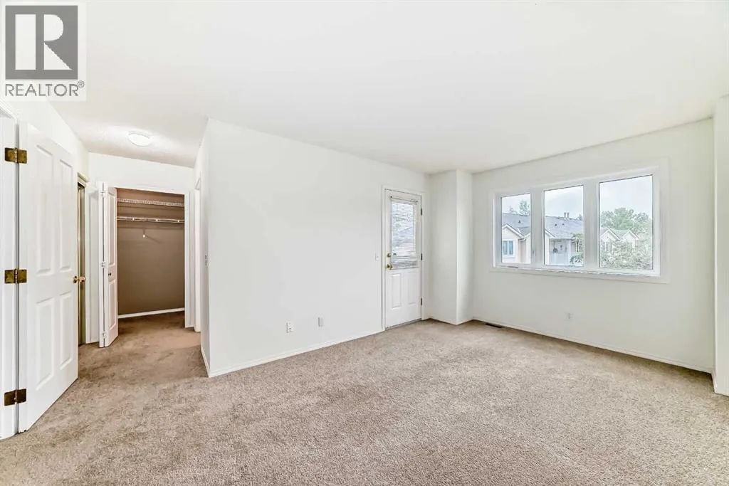 111, 388 Sandarac Drive NW