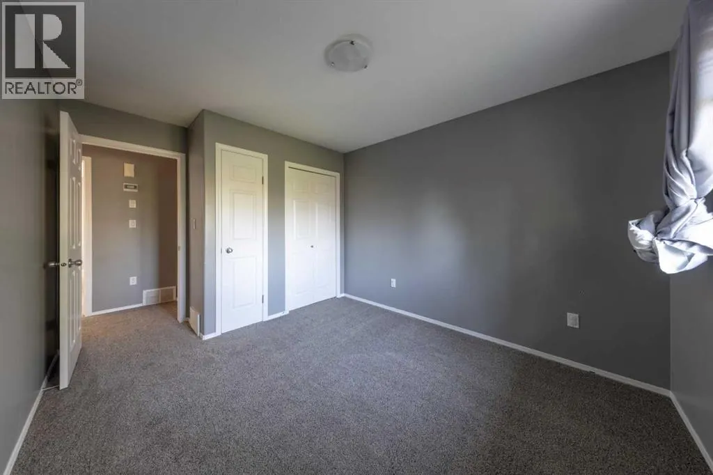 3106 65 Ave