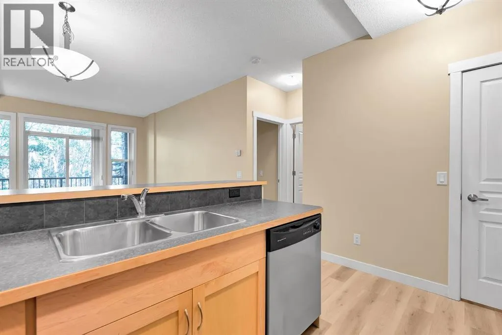 1103, 211 Aspen Stone Boulevard SW