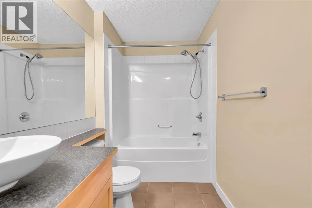 1103, 211 Aspen Stone Boulevard SW