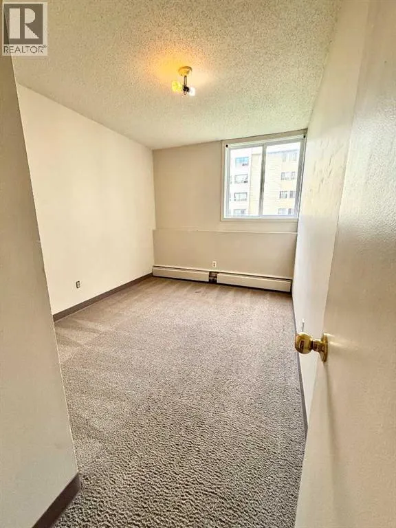 115, 111 Charles Avenue