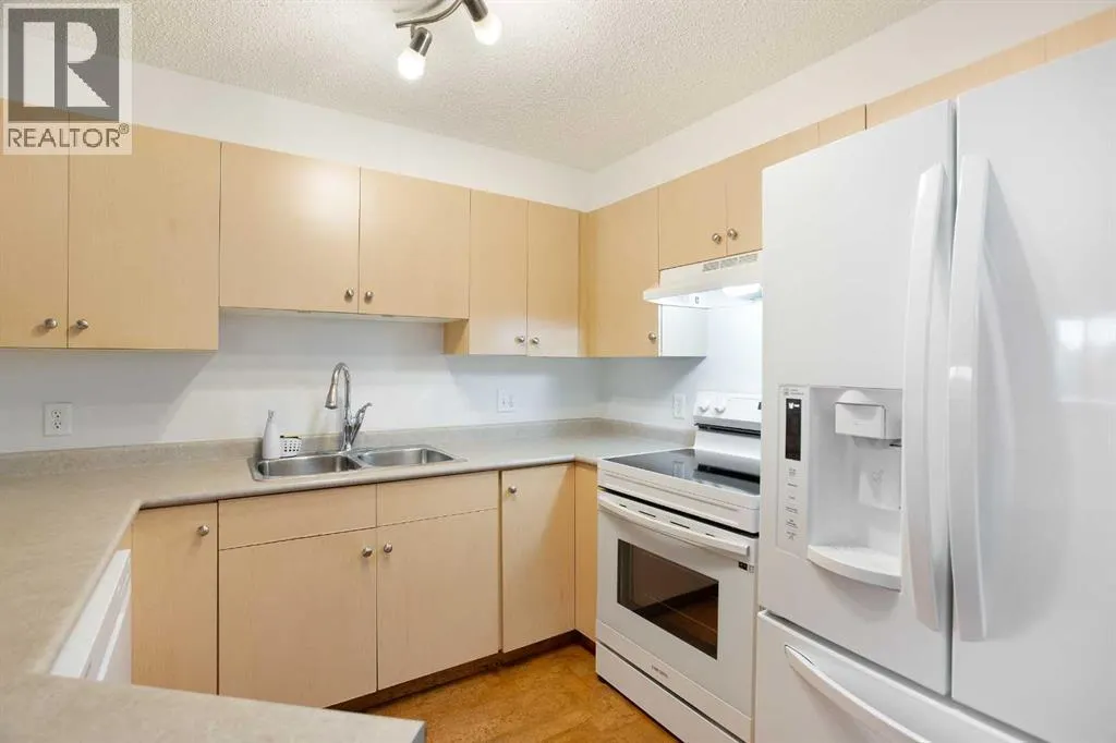 203, 5500 Somervale Court SW