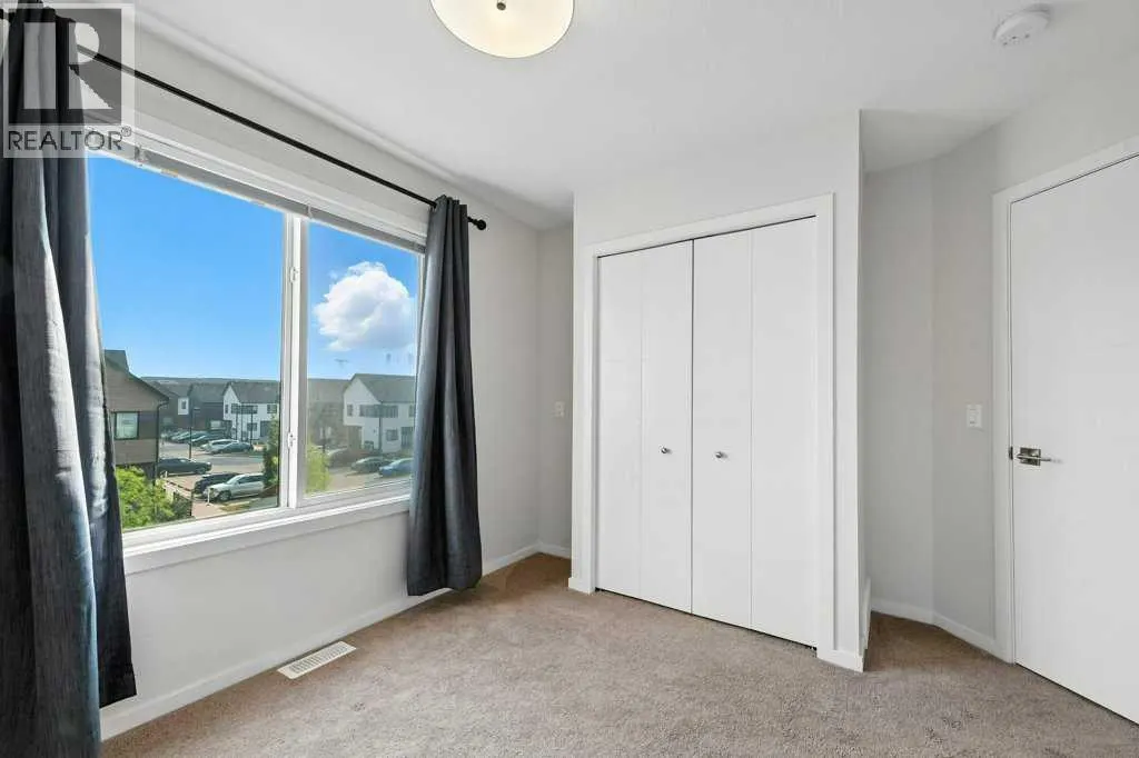 202, 125 Redstone  NE