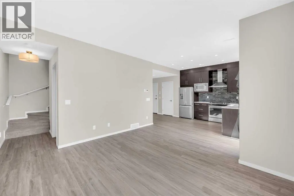 203, 525 Redstone Walk NE
