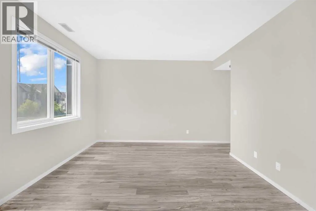 203, 525 Redstone Walk NE