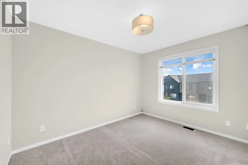 203, 525 Redstone Walk NE