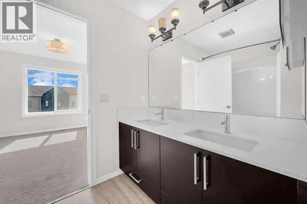 203, 525 Redstone Walk NE