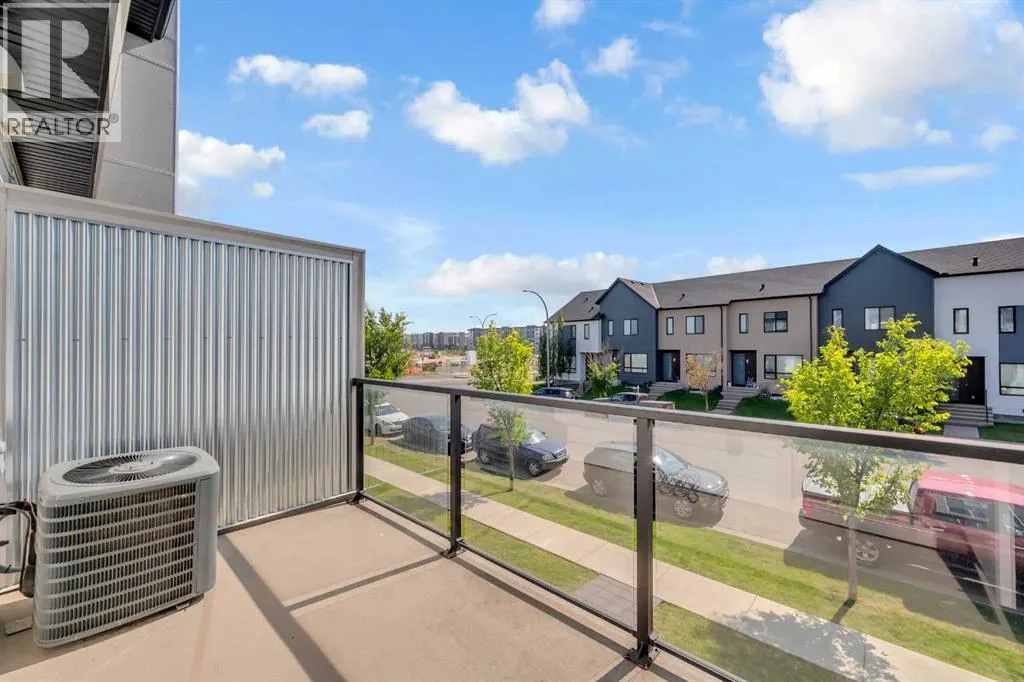 203, 525 Redstone Walk NE