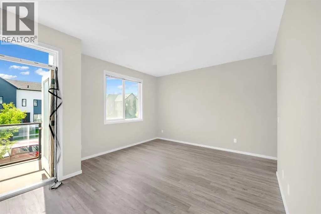 203, 525 Redstone Walk NE