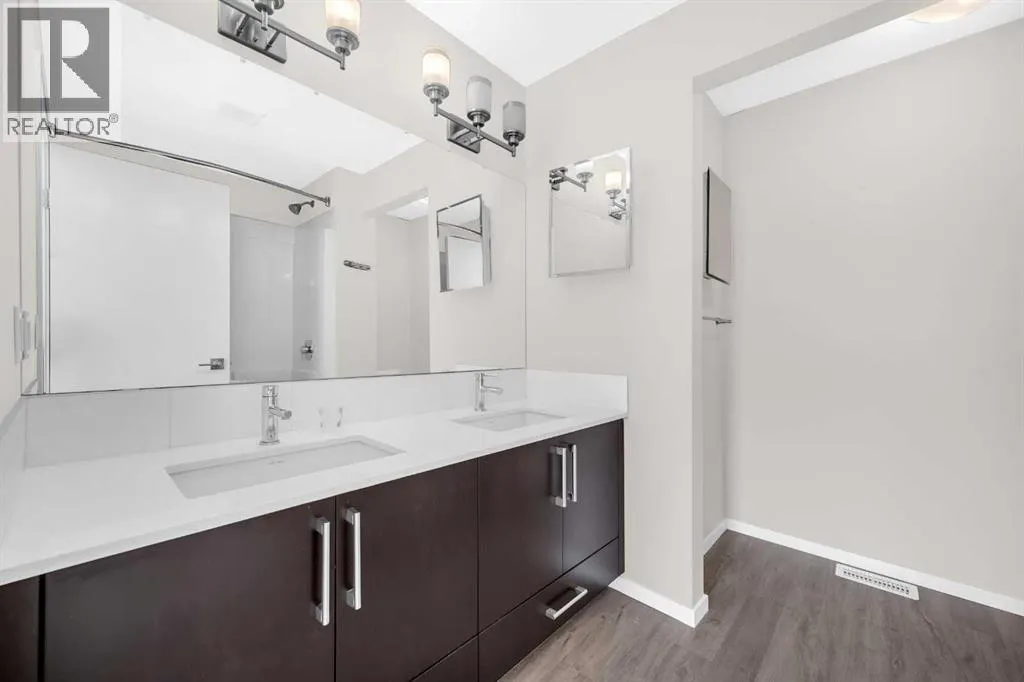 203, 525 Redstone Walk NE