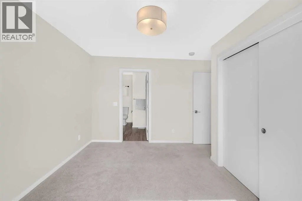 203, 525 Redstone Walk NE