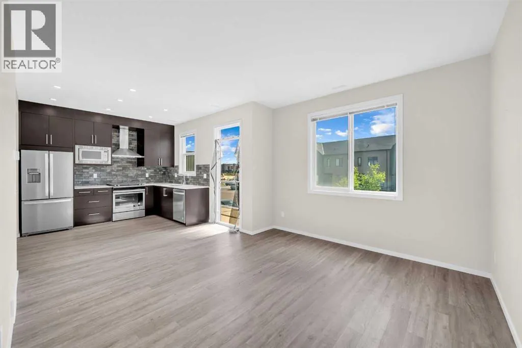 203, 525 Redstone Walk NE