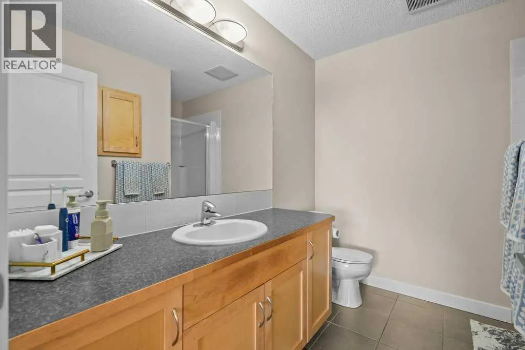 2206, 211 Aspen Stone Boulevard SW
