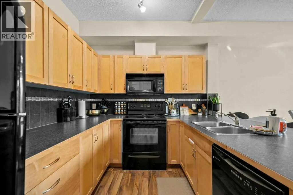2206, 211 Aspen Stone Boulevard SW