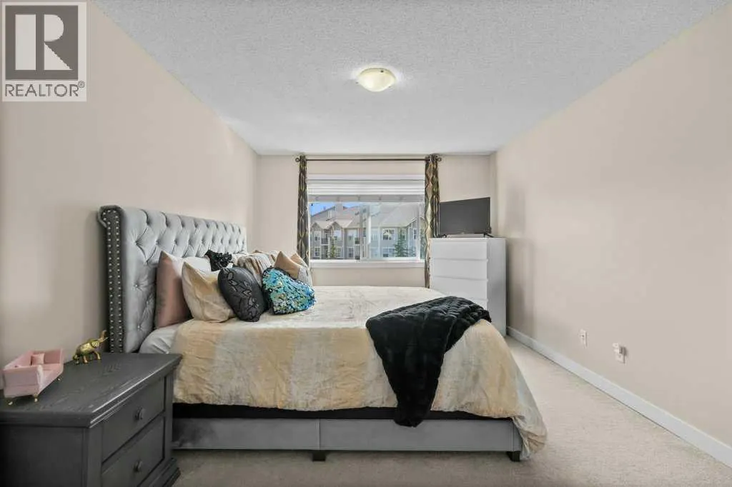2206, 211 Aspen Stone Boulevard SW