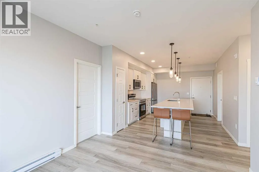 203, 360 Harvest Hills Way NE