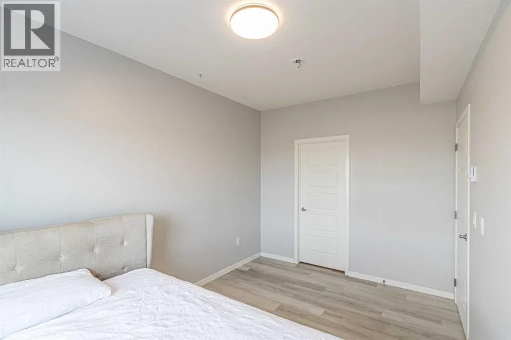 203, 360 Harvest Hills Way NE