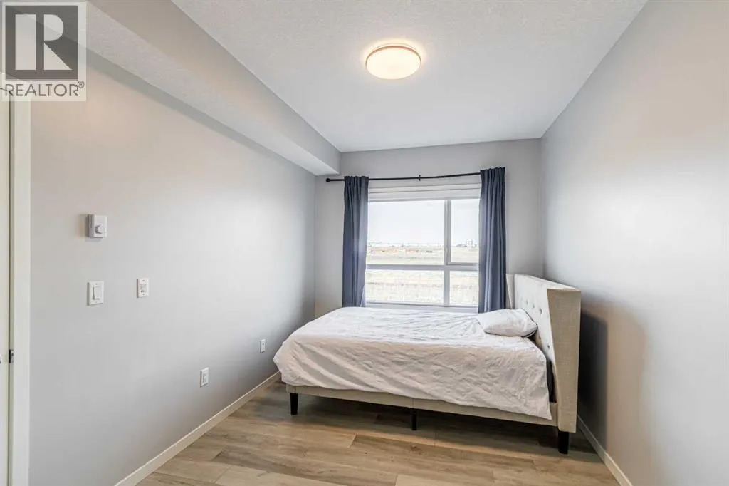 203, 360 Harvest Hills Way NE