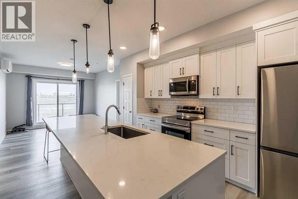 203, 360 Harvest Hills Way NE