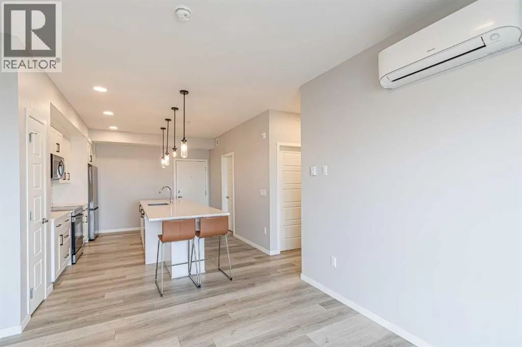 203, 360 Harvest Hills Way NE