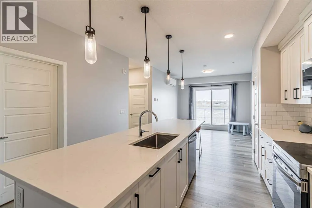 203, 360 Harvest Hills Way NE
