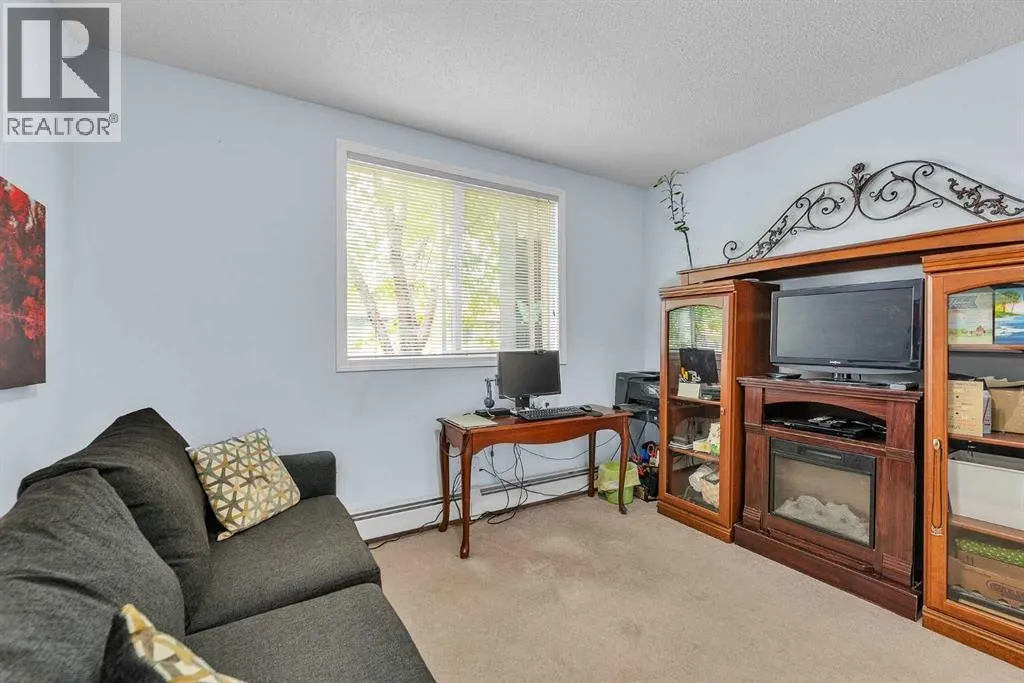 106, 2022 Canyon Meadows Drive SE