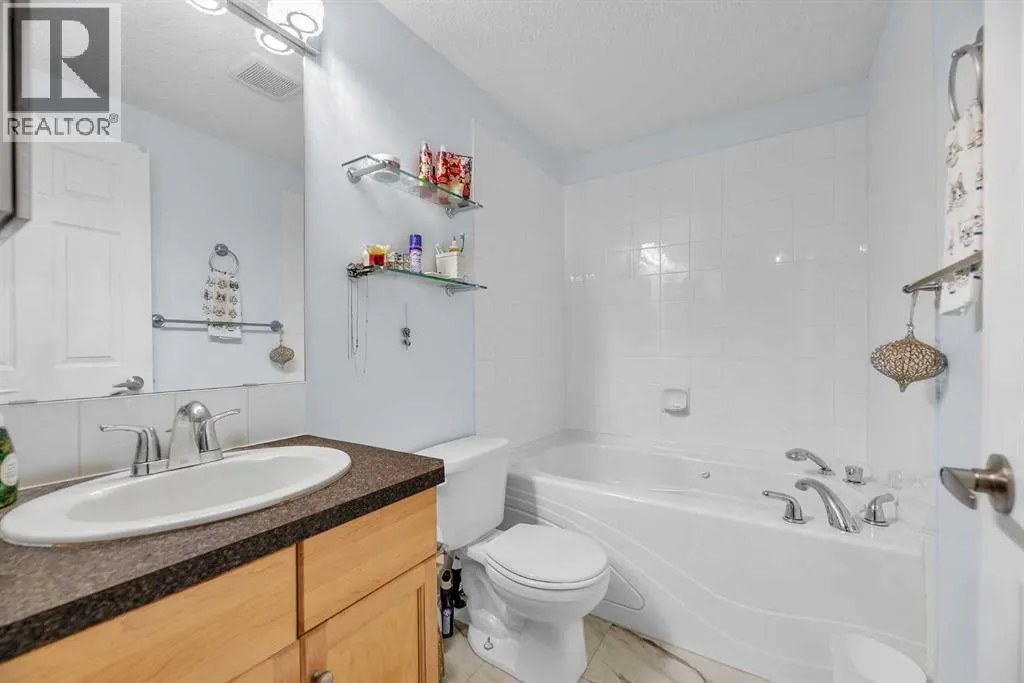 106, 2022 Canyon Meadows Drive SE