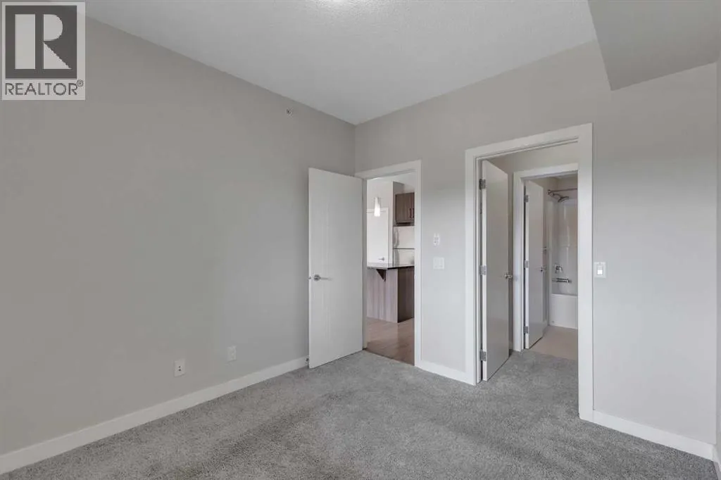 #303, 12 Sage Hill Terrace NW