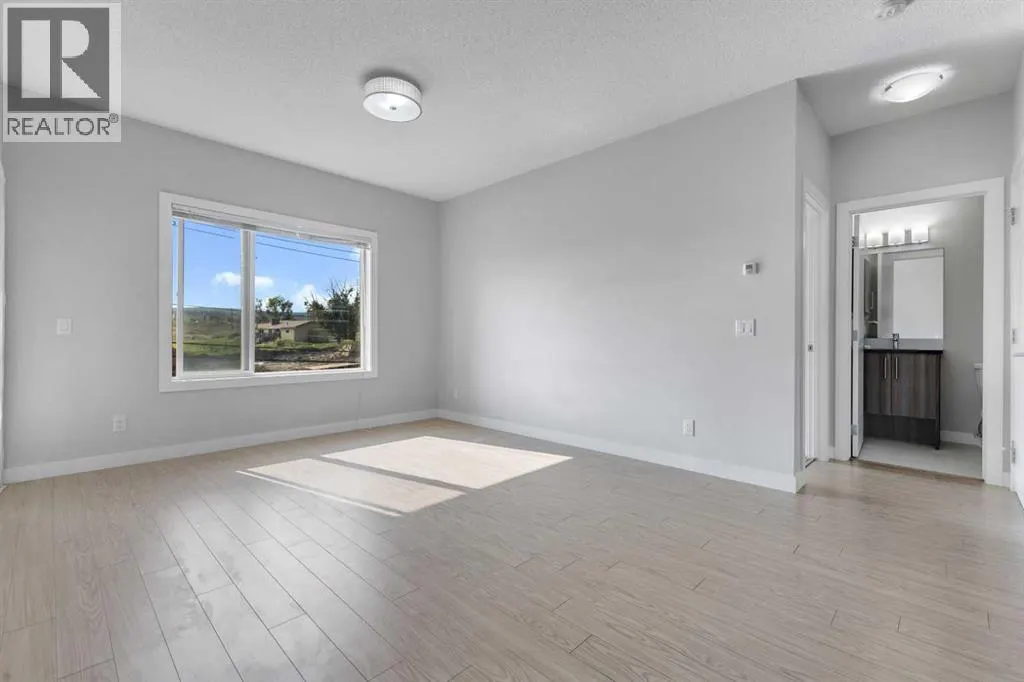 #303, 12 Sage Hill Terrace NW