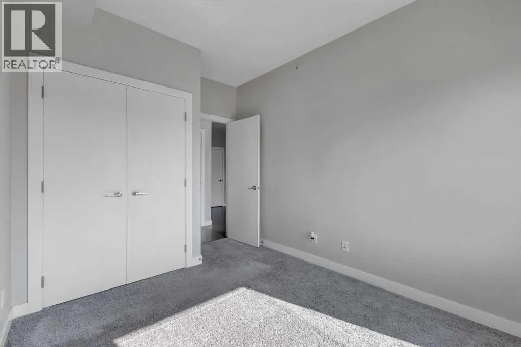 #303, 12 Sage Hill Terrace NW