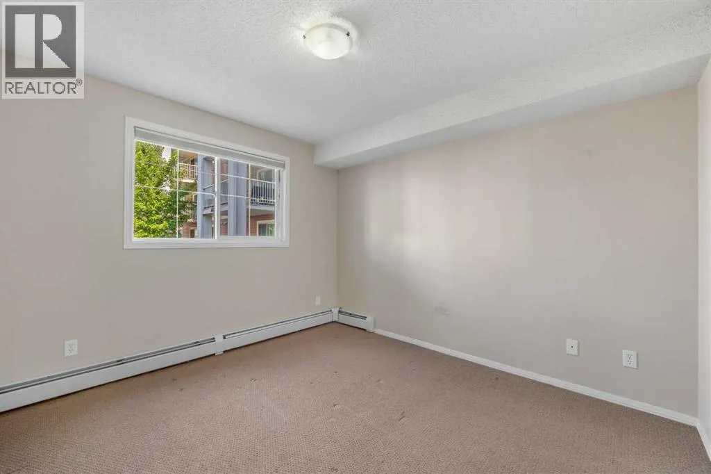 2207, 10 Prestwick Bay SE