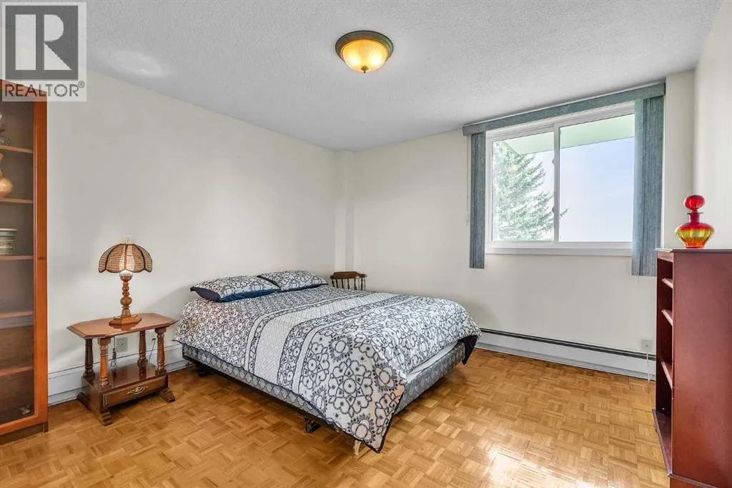 102, 516 Cedar Crescent SW
