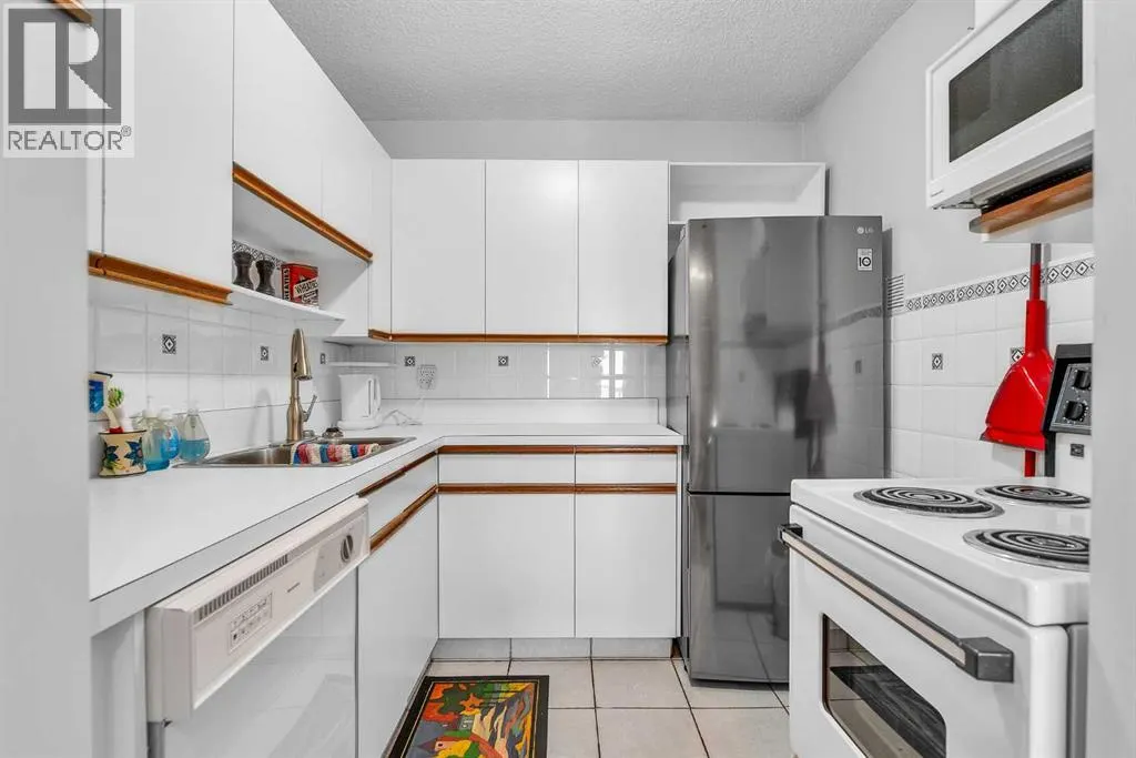 102, 516 Cedar Crescent SW