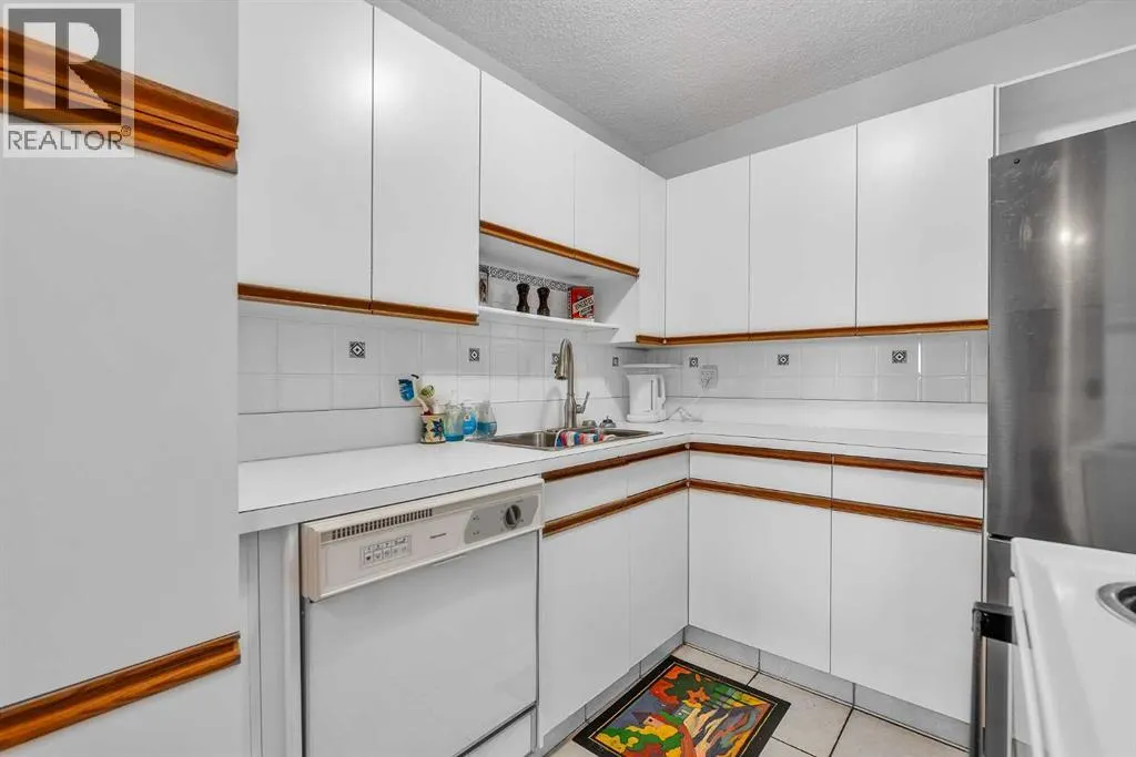 102, 516 Cedar Crescent SW